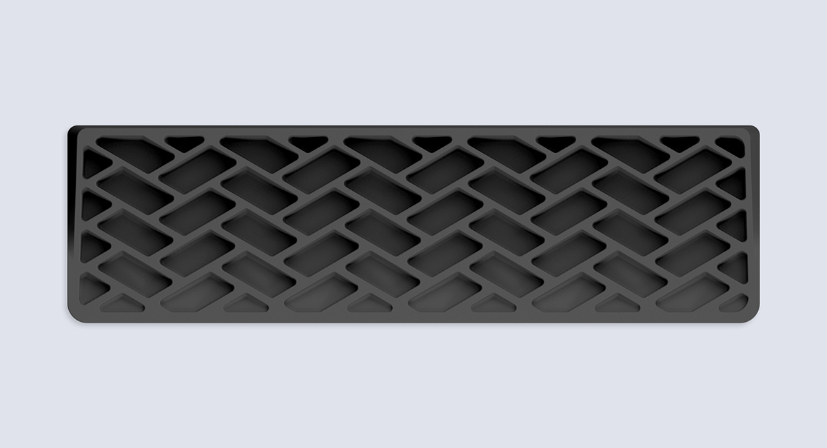 Geometric lattice pattern on the underside of the Wooting Wrist Rest 80 Black